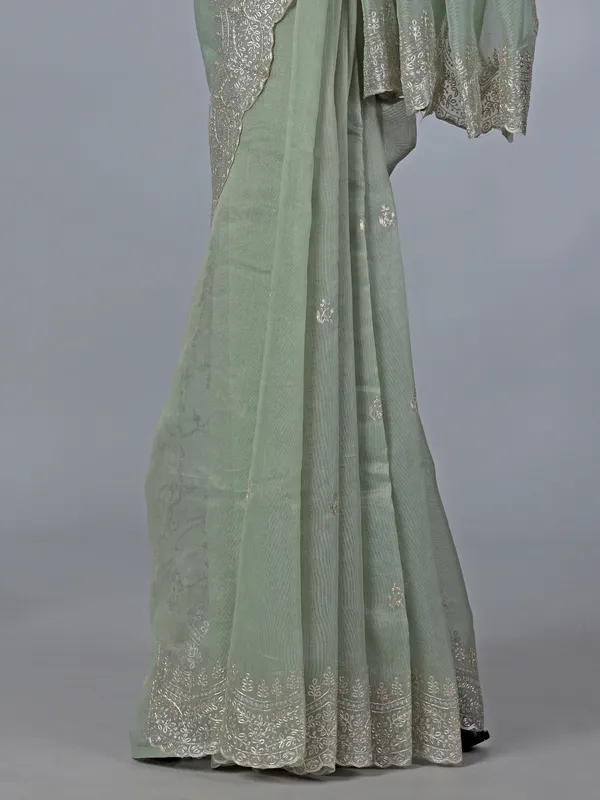 Pista green organza saree with thread work