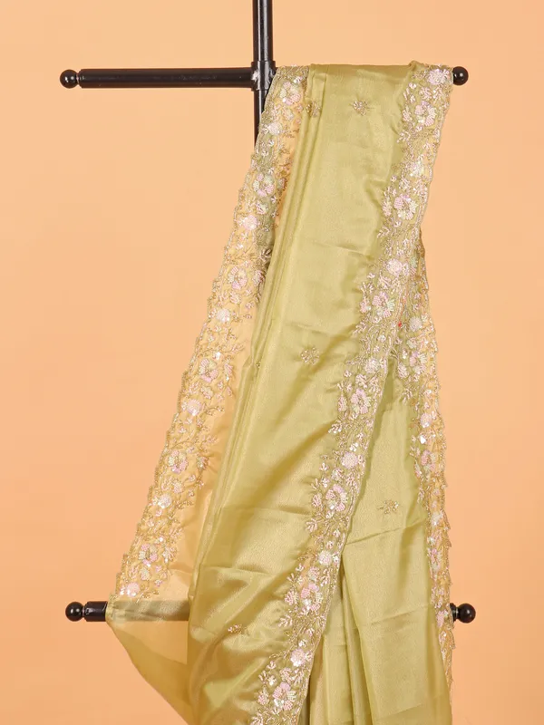 Pista green organza saree with unstitched blouse
