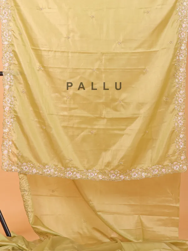 Pista green organza saree with unstitched blouse
