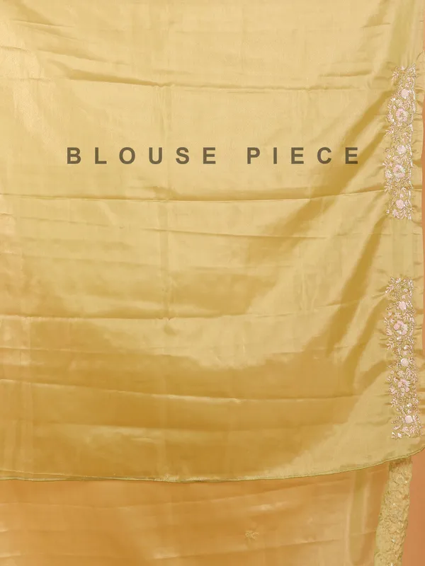 Pista green organza saree with unstitched blouse