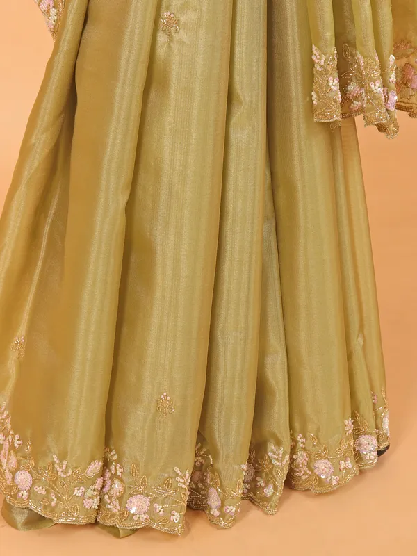 Pista green organza saree with unstitched blouse