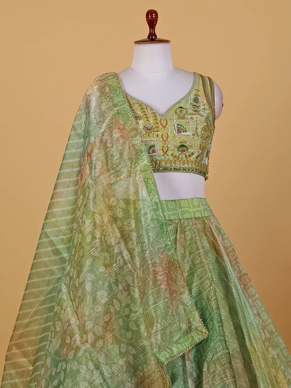 Pista green printed organza lehenga choli