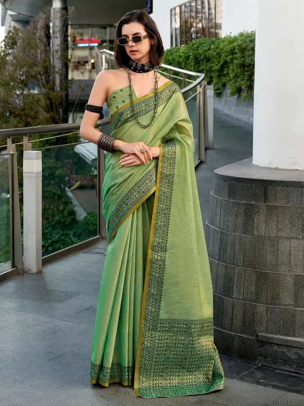 Pista green printed saree in linen tissue silk