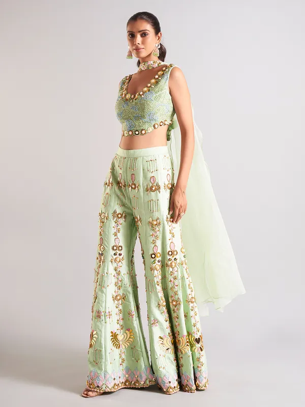 Pista green raw silk palazzo salwar suit