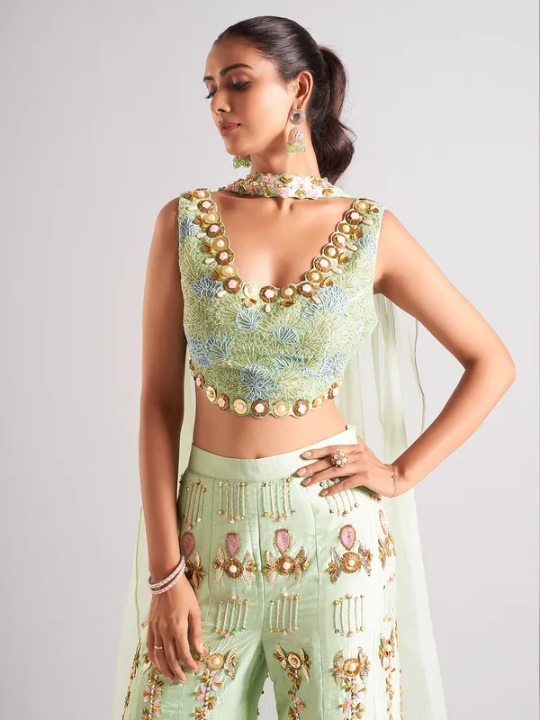Pista green raw silk palazzo salwar suit