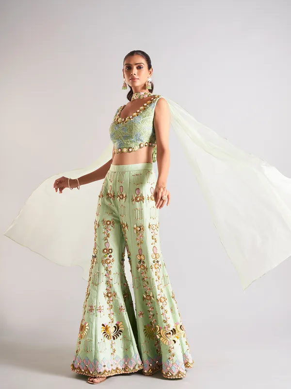 Pista green raw silk palazzo salwar suit