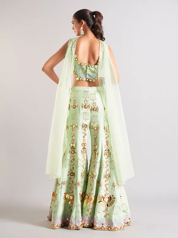 Pista green raw silk palazzo salwar suit