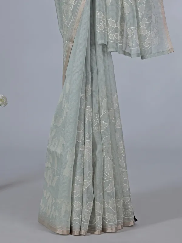 Pista green semi organza saree with refined embroidery touch