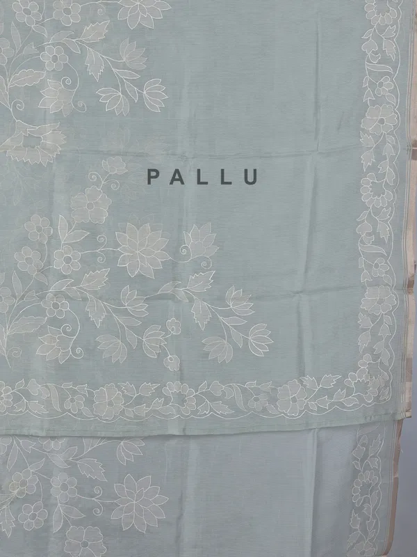 Pista green semi organza saree with refined embroidery touch