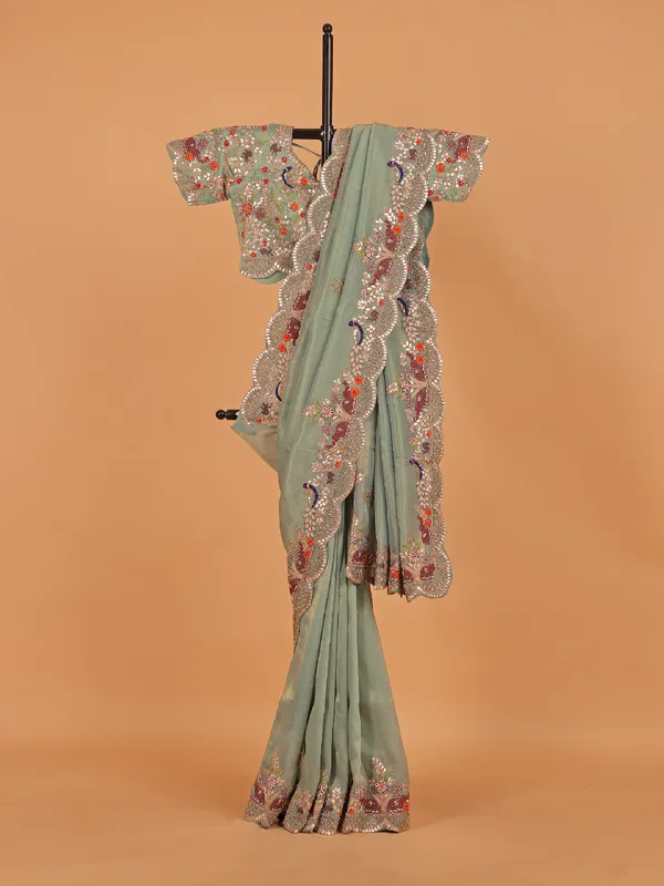 Pista green shimmer tissue silk saree
