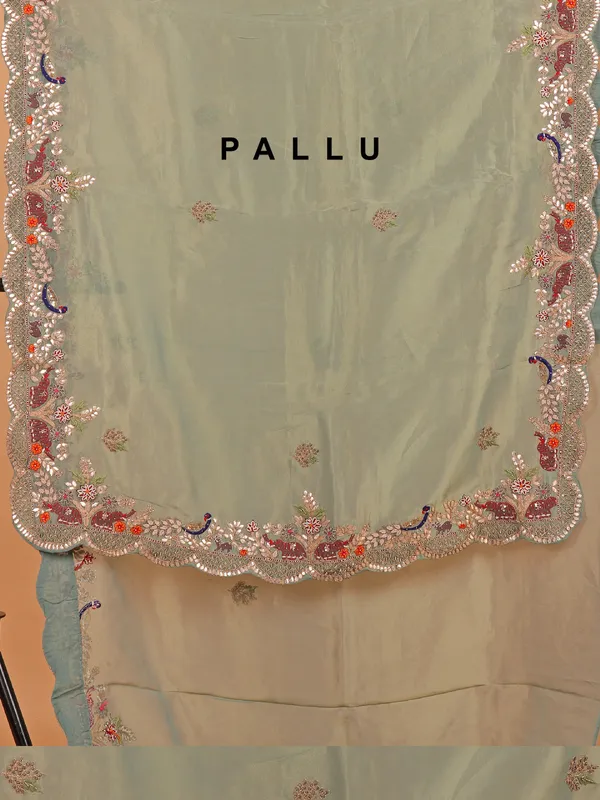 Pista green shimmer tissue silk saree