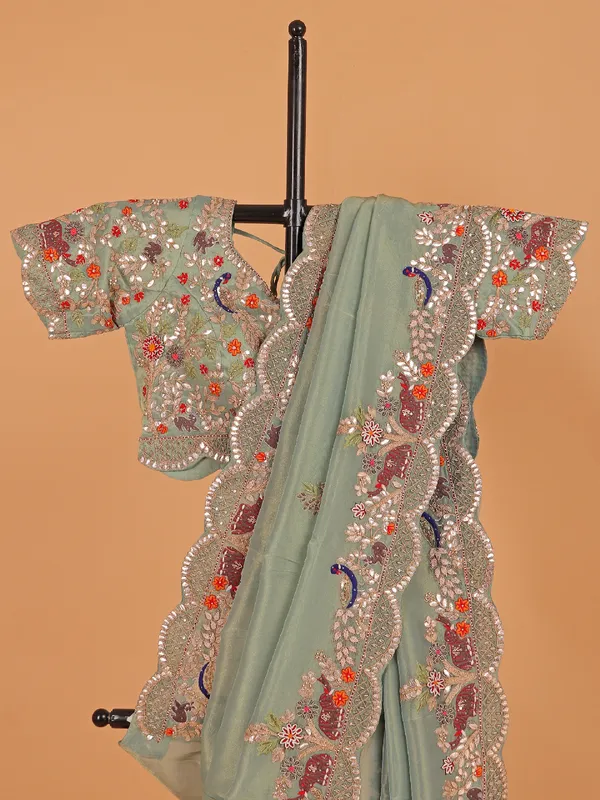 Pista green shimmer tissue silk saree