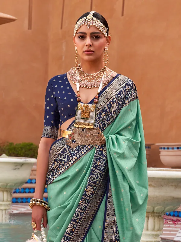 Pista green shiny patola silk saree