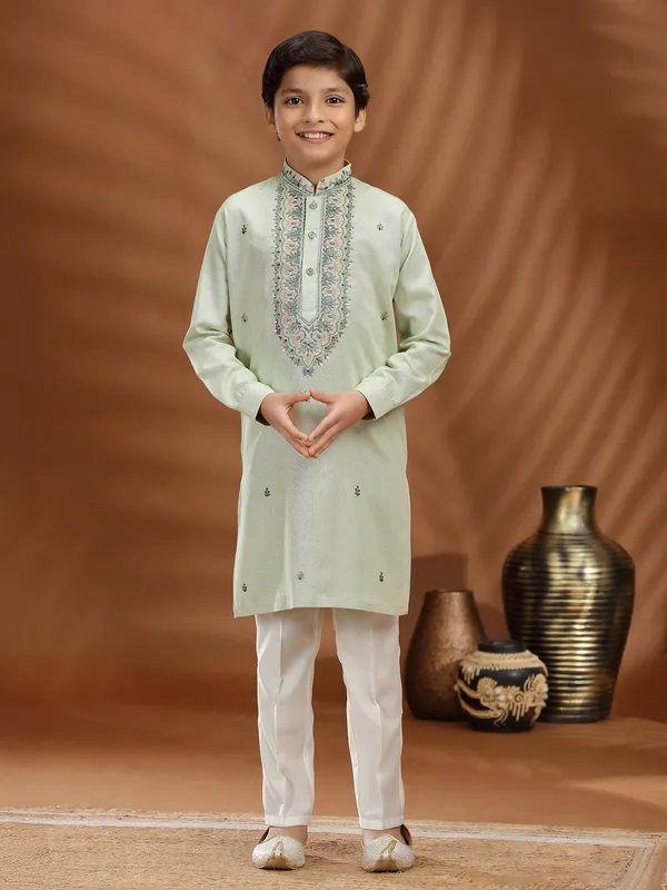 Pista green silk embroidered kurta suit