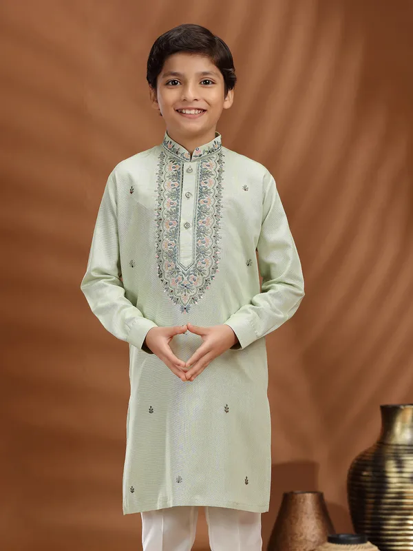 Pista green silk embroidered kurta suit