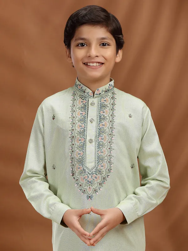Pista green silk embroidered kurta suit