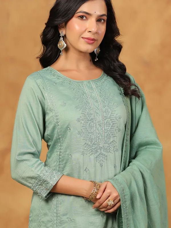 Pista green silk kurti set with sequins work
