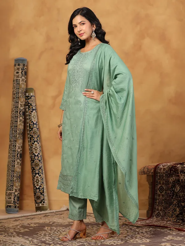 Pista green silk kurti set with sequins work