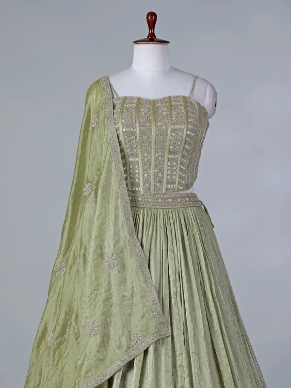 Pista green silk lehenga choli with diamond detailing