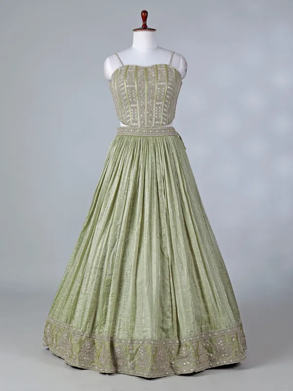 Pista green silk lehenga choli with diamond detailing
