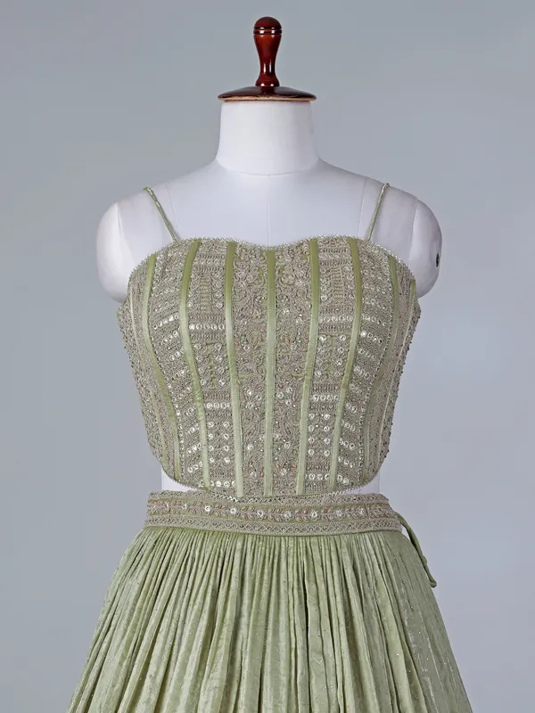 Pista green silk lehenga choli with diamond detailing