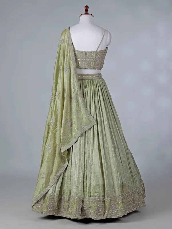 Pista green silk lehenga choli with diamond detailing