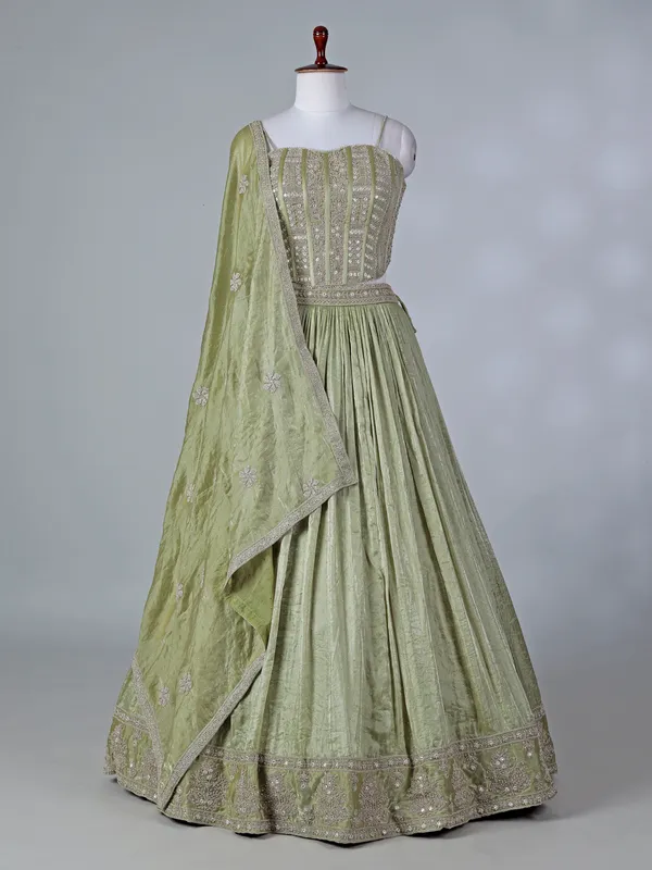 Pista green silk lehenga choli with diamond detailing