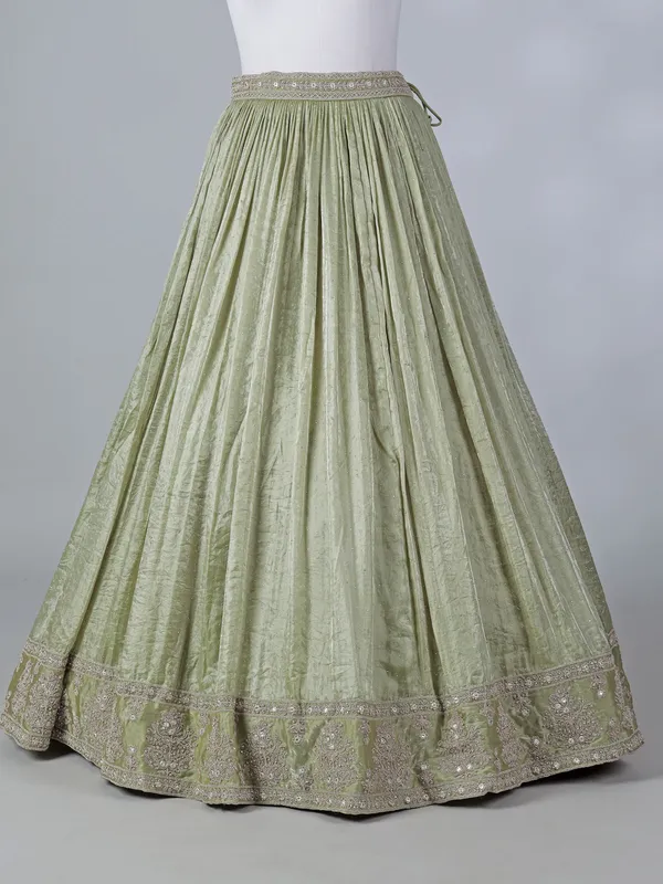 Pista green silk lehenga choli with diamond detailing