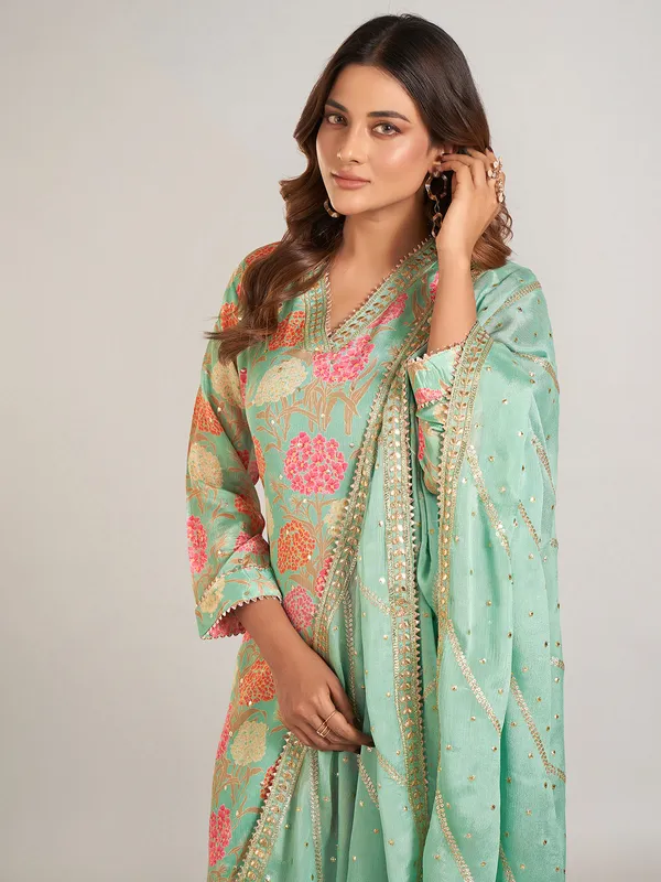 Pista green silk printed sharara suit for wedding