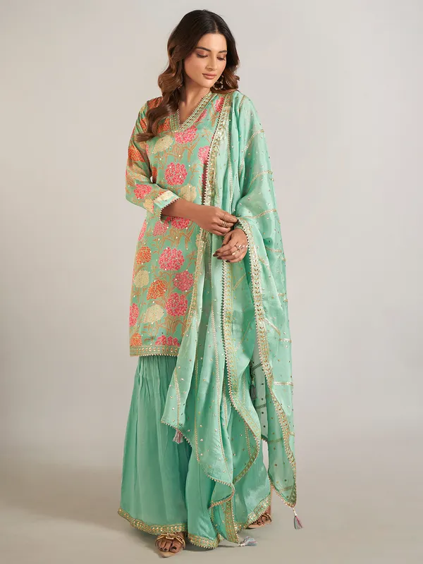 Pista green silk printed sharara suit for wedding