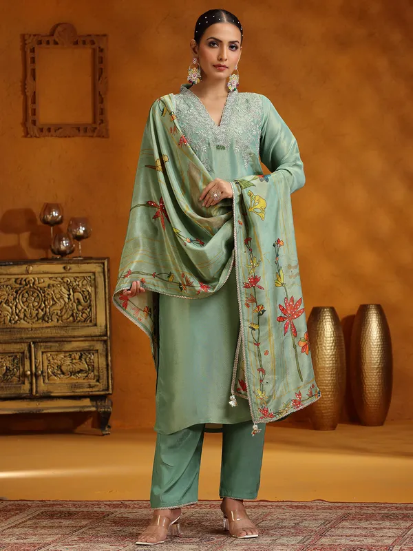 Pista green silk salwar suit with printed dupatta
