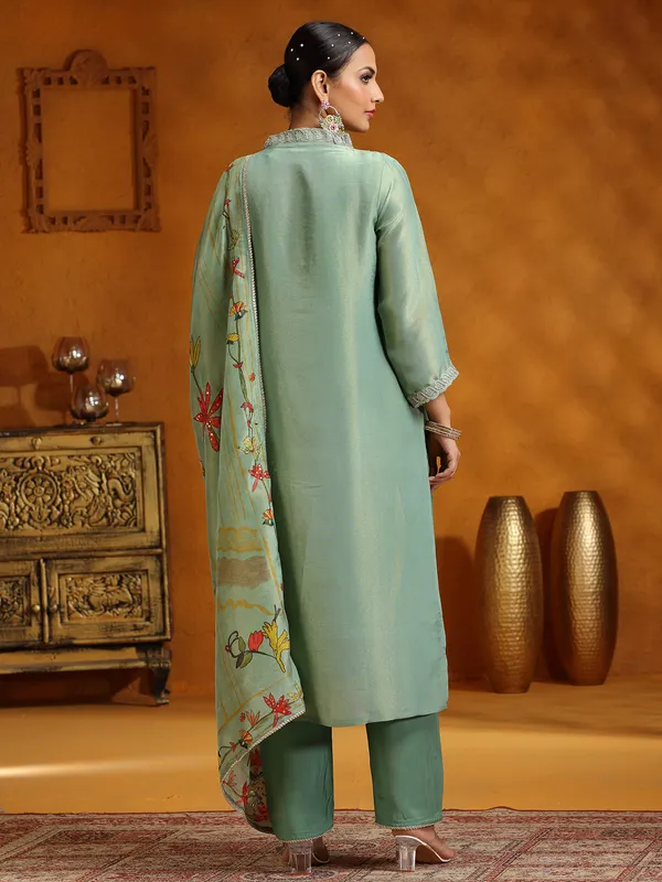 Pista green silk salwar suit with printed dupatta