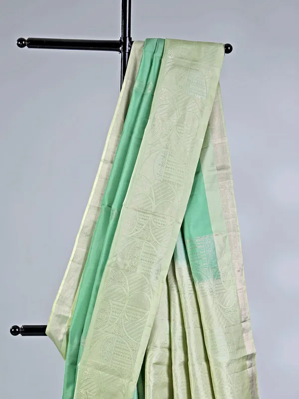 Pista green silk saree with delicate zari weaving
