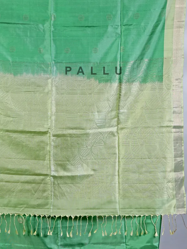 Pista green silk saree with delicate zari weaving