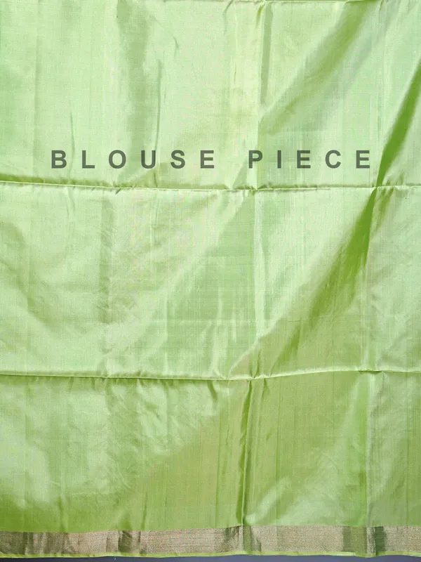 Pista green silk saree with delicate zari weaving
