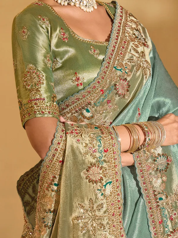 Pista green silk saree with zardosi work