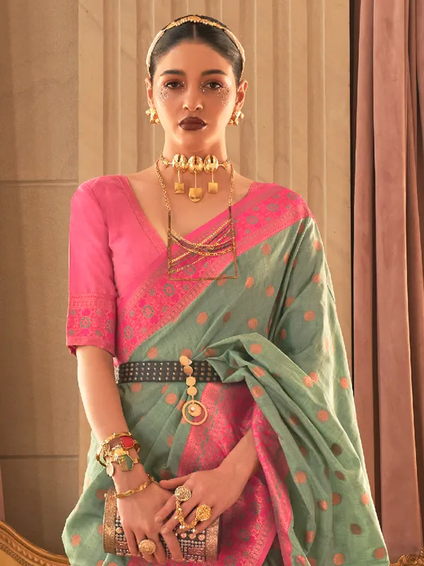 Pista green silk saree with zari woven