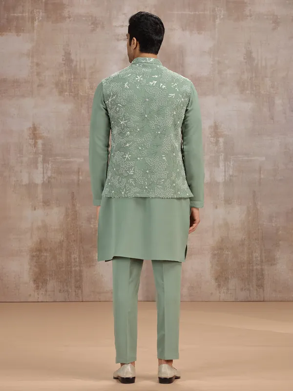 Pista green silk waistcoat set with cutdana work
