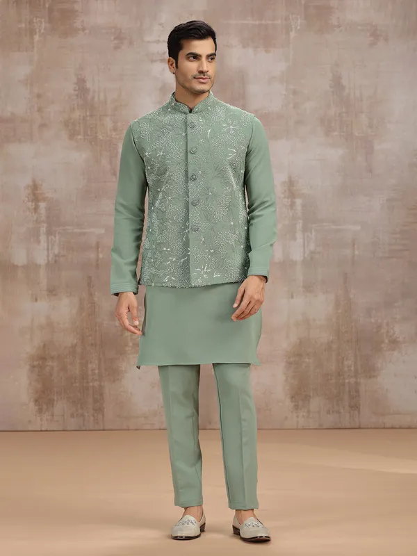 Pista green silk waistcoat set with cutdana work