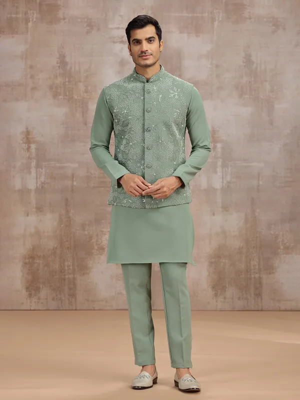 Pista green silk waistcoat set with cutdana work