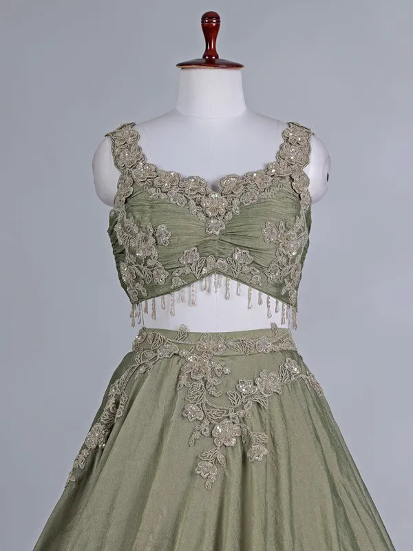 Pista green tissue organza lehenga choli with resham work