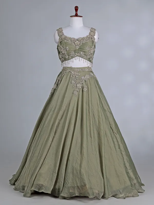 Pista green tissue organza lehenga choli with resham work