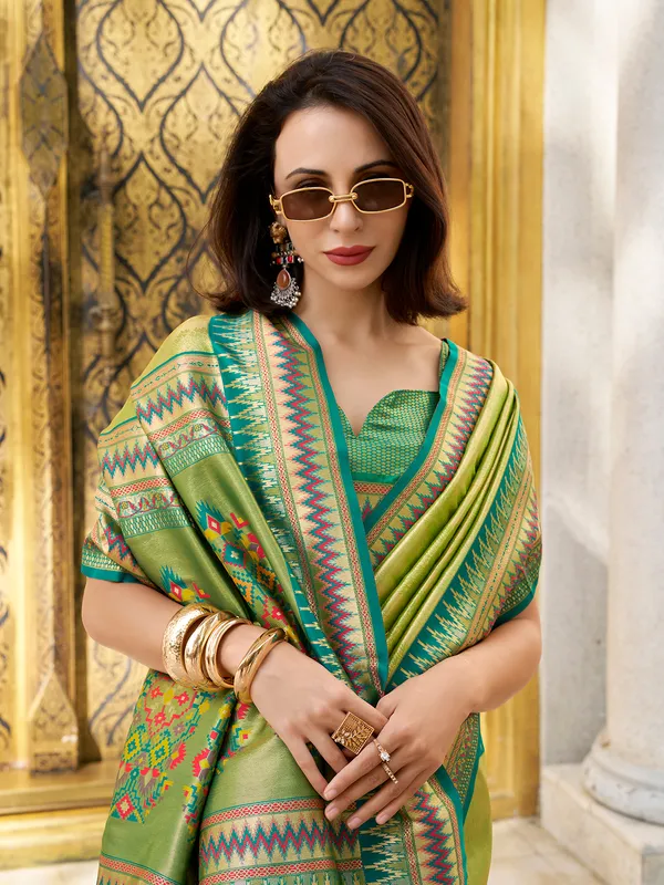 Pista green tissue silk saree for festive