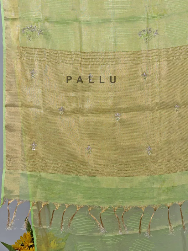 Pista Green tissue silk saree for festive celebration
