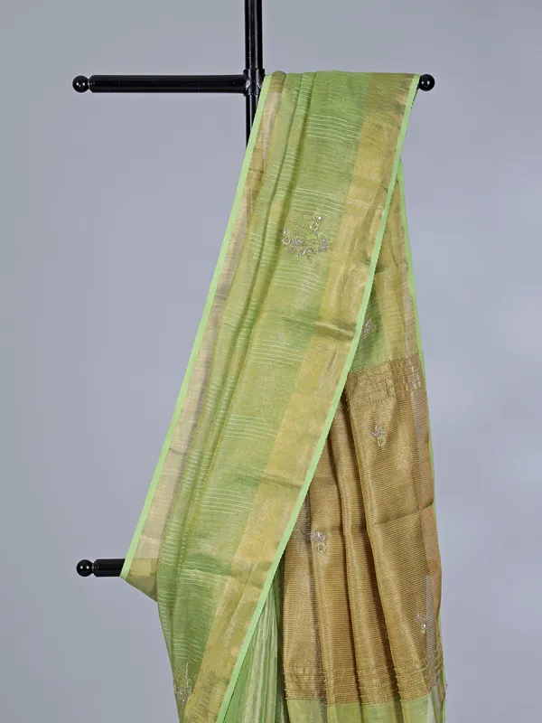 Pista Green tissue silk saree for festive celebration
