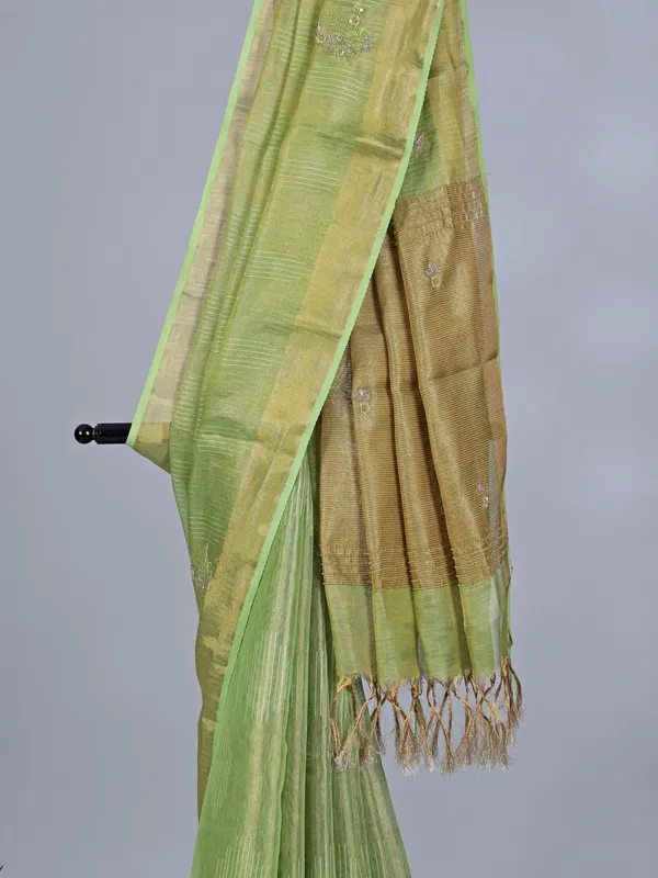 Pista Green tissue silk saree for festive celebration