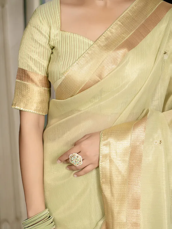 Pista green tissue silk saree for festive wear