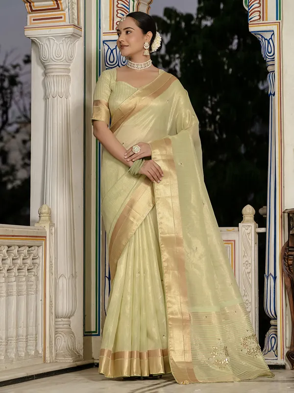 Pista green tissue silk saree for festive wear