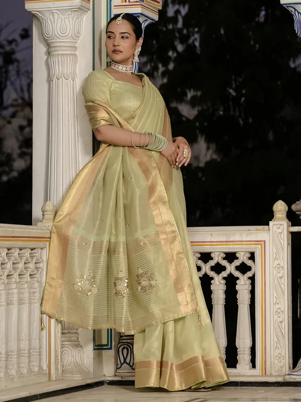 Pista green tissue silk saree for festive wear