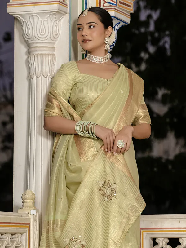 Pista green tissue silk saree for festive wear